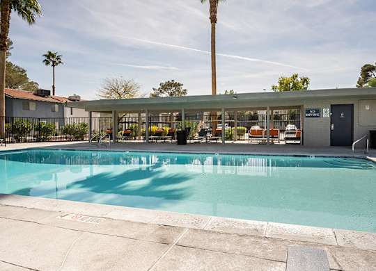 Community Swimming Pool at Bridges at Tropicana Apartments located in Las Vegas, Nevada.