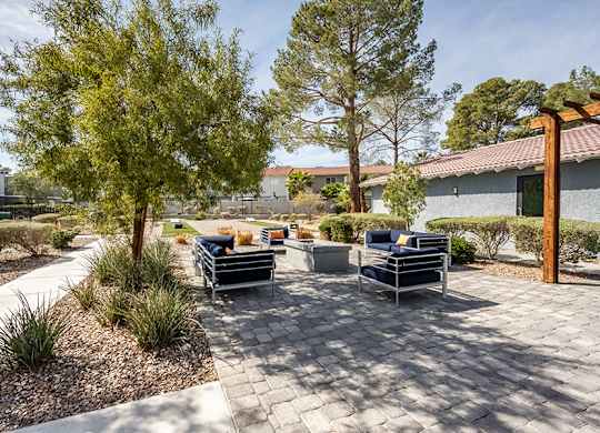 Community Fire Pit Area at Bridges at Tropicana Apartments located in Las Vegas, Nevada.