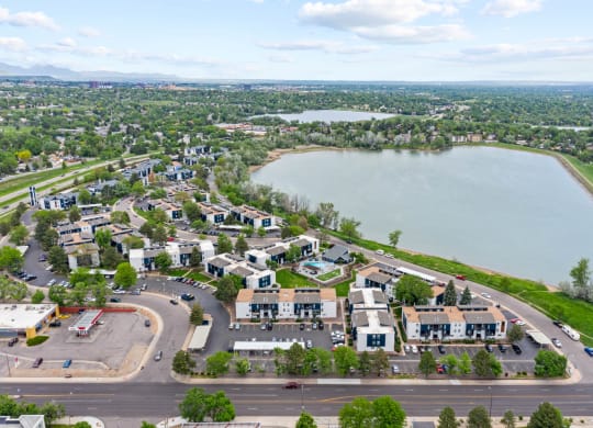 Aerial view of the lake and the apartment community
