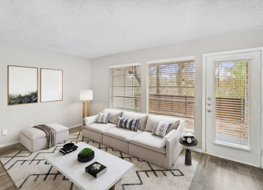 a living room with a couch and a coffee table