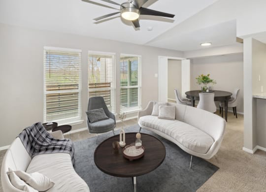 a living room with a couch and a table