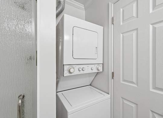A white oven and stove in a kitchen.