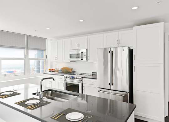 Kitchen area with appliances at 65 Bay Street, New Jersey, 07302