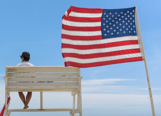 Lifeguard stand with american flag at beachfront at Pier Village Apartments, Long Branch, NJ 7740