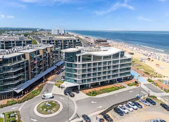 Modern beachfront buildings with curved architecture and oceanview at Pier Village Apartments, Long Branch, New Jersey