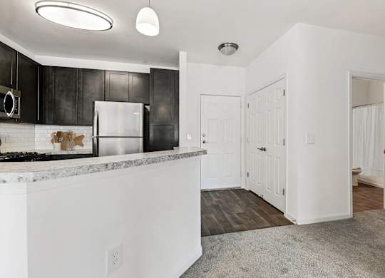 Kitchen And Living Area at The Apartments at Cambridge Court, Rosedale, MD