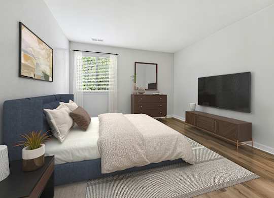 A bedroom with a bed, nightstand, and a television.