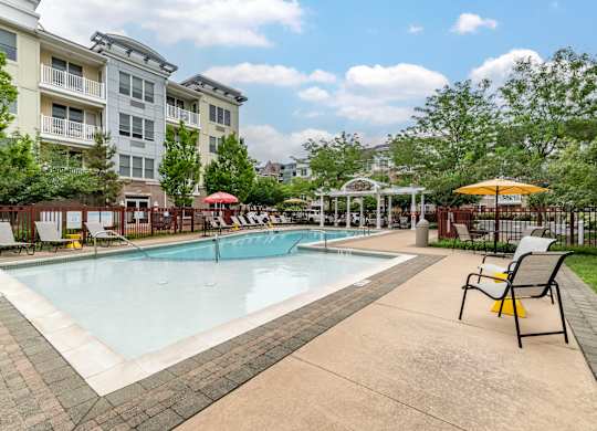 Community pool with sundeck and gazebo at Pier Village Apartments, New Jersey