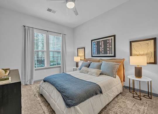 A Bedroom with a Large Bed at District 757 Apartments, Norfolk, VA, 23502