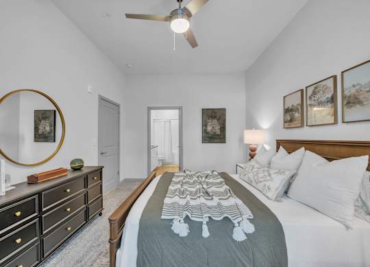 A Bedroom with a Dresser at District 757 Apartments, Virginia, 23502
