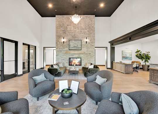 A Clubhouse with Grey Chairs at District 757 Apartments, Norfolk, Virginia