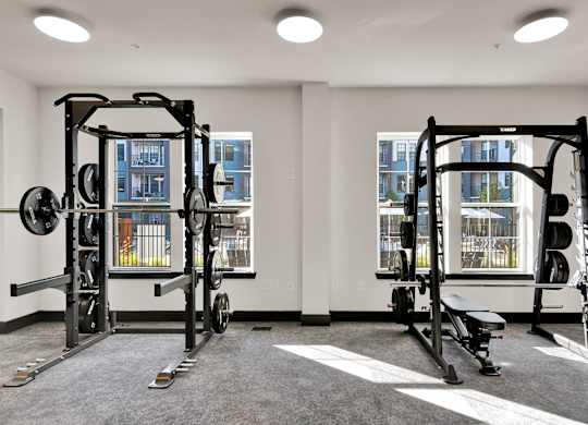 A Gym with a Squat Rack at District 757 Apartments, Norfolk