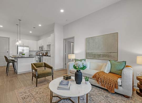 A Living Room with a Couch at District 757 Apartments, Norfolk