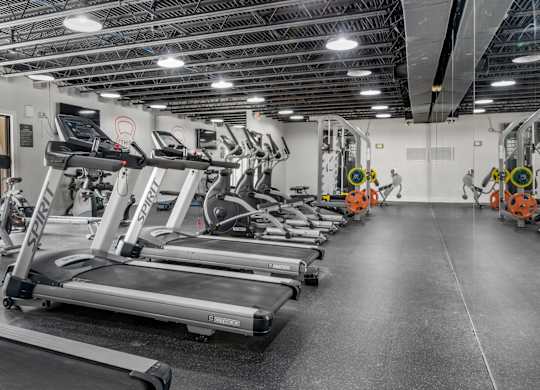 A gym with treadmills at Riverchase Landing Apartments, Hoover, 35244