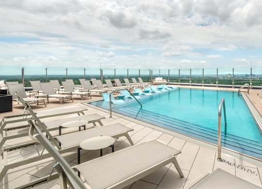 Pool with Lounge Chairs at Eastline Residences Apartments, Texas, 75206