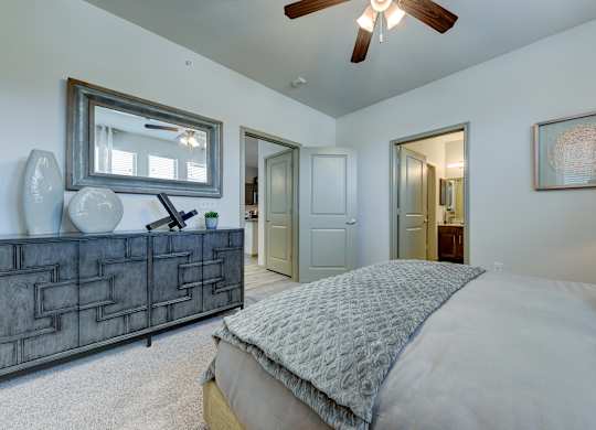 Bedroom with bed, lampsat Estraya Westover Hills, San Antonio at Estraya Westover Hills, San Antonio