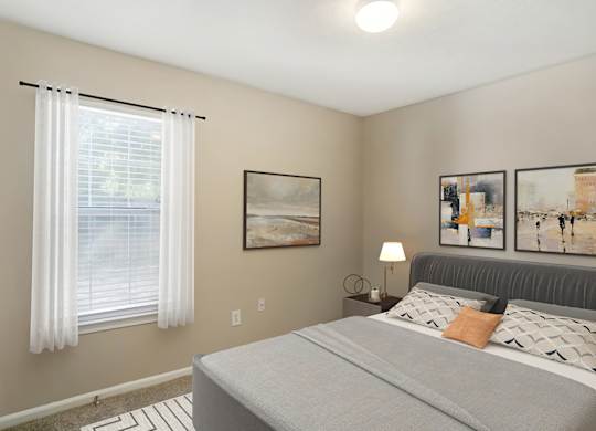 Bedroom with windows at Grand at Pearl Apartments, Pearl, Mississippi