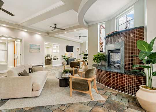 Lounge Area With Fireplace at River House Apartments, Norfolk