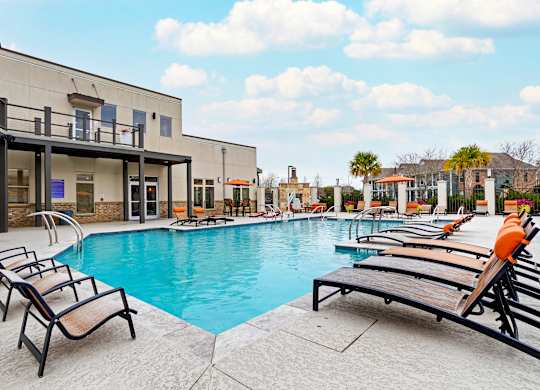 Pool with deck at La Veranda at Polly Lane Apartments, Louisiana