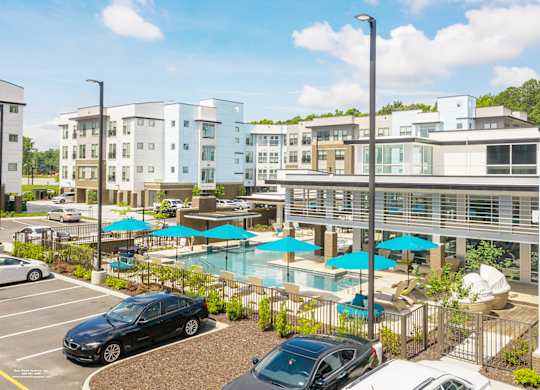 Swimming pool and parking at Lumen Apartments, Virginia, 23666