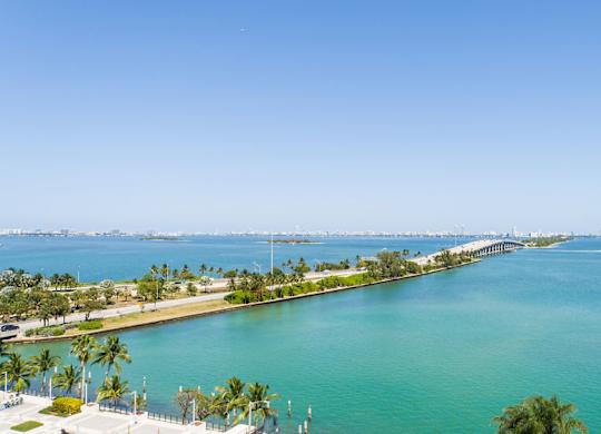 a view of a body of water and a bridge at The Hamilton, Miami, 33137