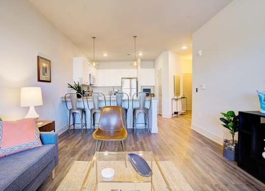 Living Room and Kitchen View at Midtown Row Apartments, Montgomery, 36106