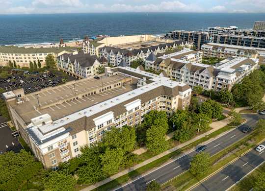 Aerial view of coastal apartment buildings near beach at Pier Village Apartments, Long Branch, New Jersey