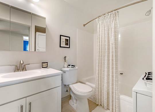 a bathroom with a sink toilet and a shower at Quail Ridge, Plainsboro Township, New Jersey