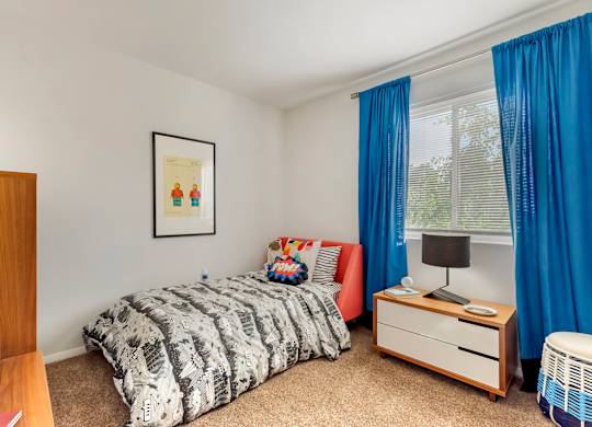 a bedroom with a bed and a dresser and a window at Quail Ridge, Plainsboro Township, NJ, 08536