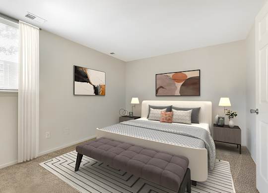 a bedroom with a large bed and two windows at Copper and Quarry Village, Maryland