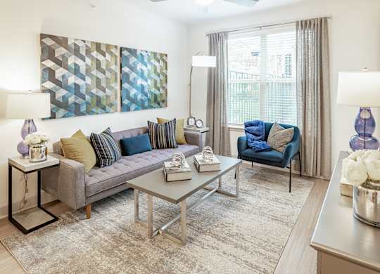 Living room at Stone Loch Apartments, Tomball, TX
