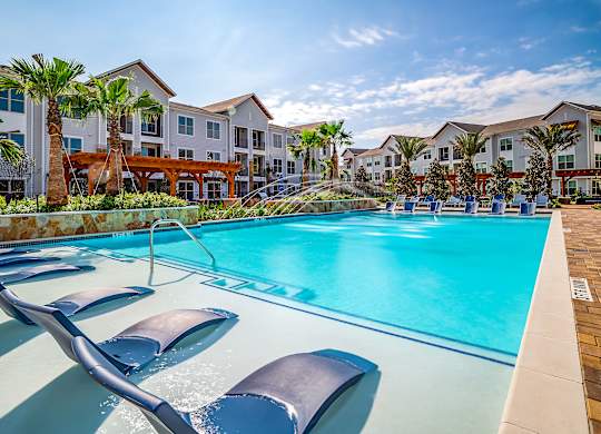Pool with Deck at Stone Loch Apartments, Tomball, TX 77375