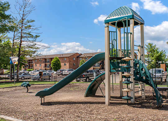A Playground  with Slide at The Manor/The Manor East Apartments, Leesburg, VA