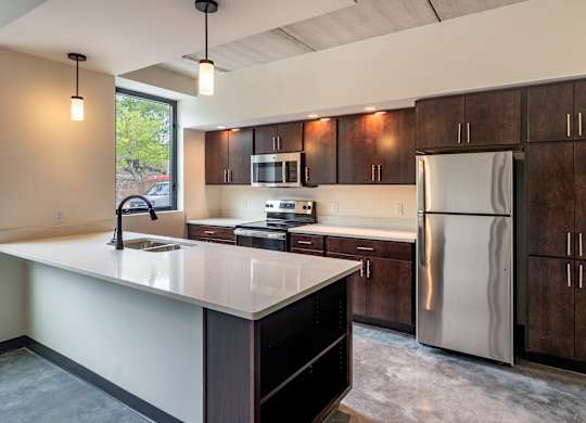 Kitchen with fridge at The 503 Apartments, Dayton, OH