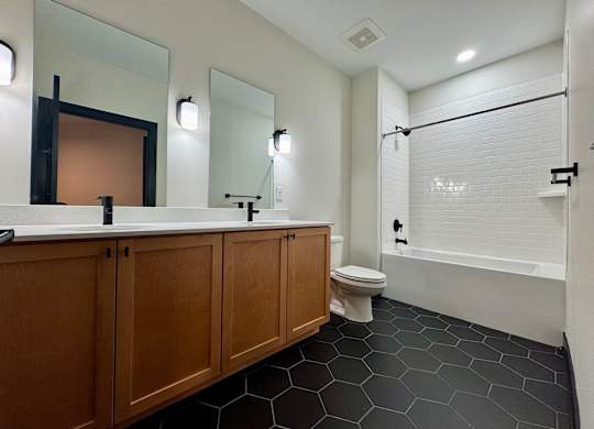 Bathroom with White Tub at The Yard Apartments, Kentucky