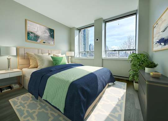 a guest bedroom with a console, two side tables, and a large window