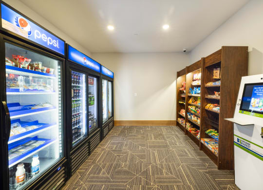a convenience store with refrigerators and a vending machineat Northern Lights a Lifestyle-Driven Community, West Fargo, 58078