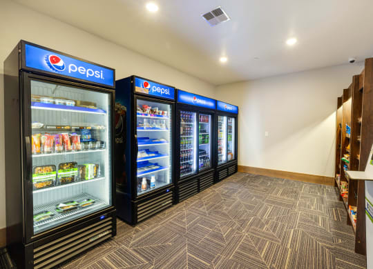 a convenience store with refrigerators and vending machinesat Northern Lights a Lifestyle-Driven Community, West Fargo, 58078