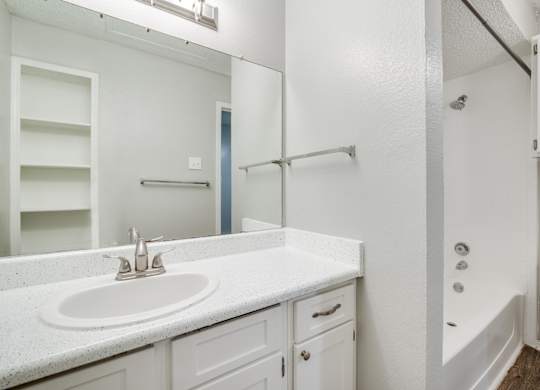 a bathroom with a sink and a shower and a toilet at Foxborough Apartments, Irving, TX, Texas, 75061