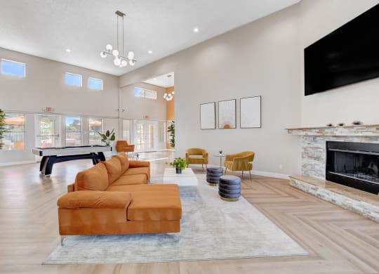 Living room with TV at Citrus Apartments, Las Vegas