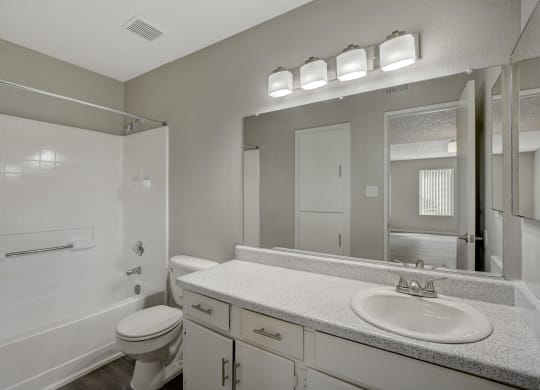 Bathroom with white sink at Citrus Apartments, Las Vegas, Nevada