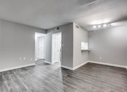 Wood Floor Living Room at Bellaire Oaks Apartments, Houston, Texas