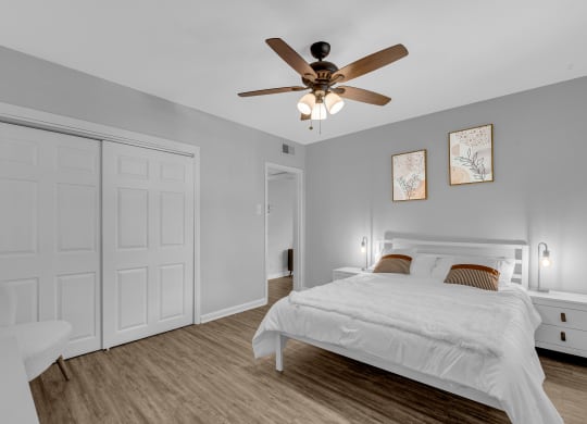 Bedroom with ceiling fan at Hampton Gardens, Saint Louis