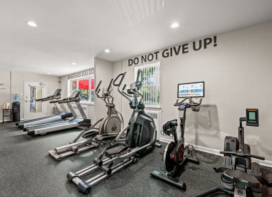 Fitness center with cardio equipment's at the enclave at woodbridge apartments in sugar land, tx
