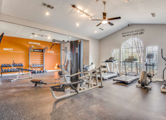 our state of the art gym is equipped with cardio equipment and weights at Foxborough Apartments, Irving, TX, 75061