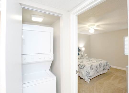 a bedroom with a closet and a laundry room with a bed at Granite Bay, Phoenix, Arizona, 85023