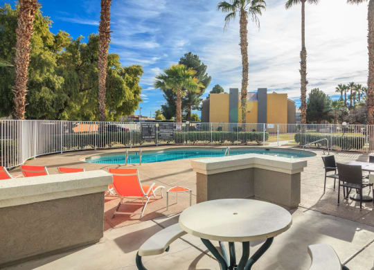 Swimming pool with relaxing area at Citrus Apartments, Las Vegas, Nevada