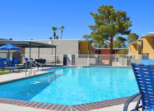 a swimming pool at a resort with chairs and umbrellas  Region2 at Summer Meadows, Nevada