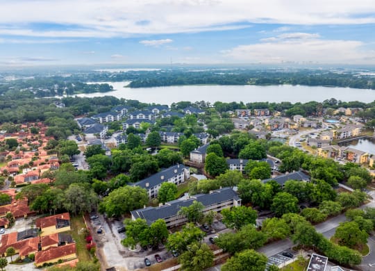 Aerial view of the neighborhood with a body of water at Village Lakes, Orlando, FL, 32808