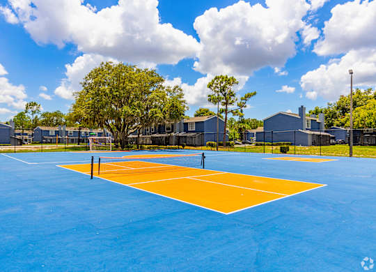 the tennis court at the estates apartments